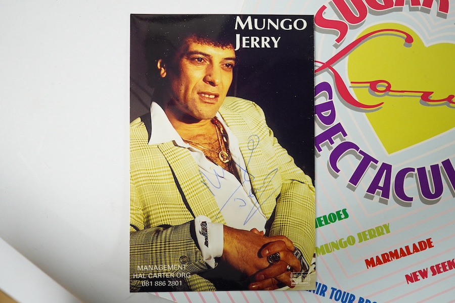 A Mungo Jerry autographed photo and three concert programmes, one a Souvenir Tour Brochure dated 1995 containing autographs of the Rubettes, Mungo Jerry, and Marmalade. Condition - fair to good.